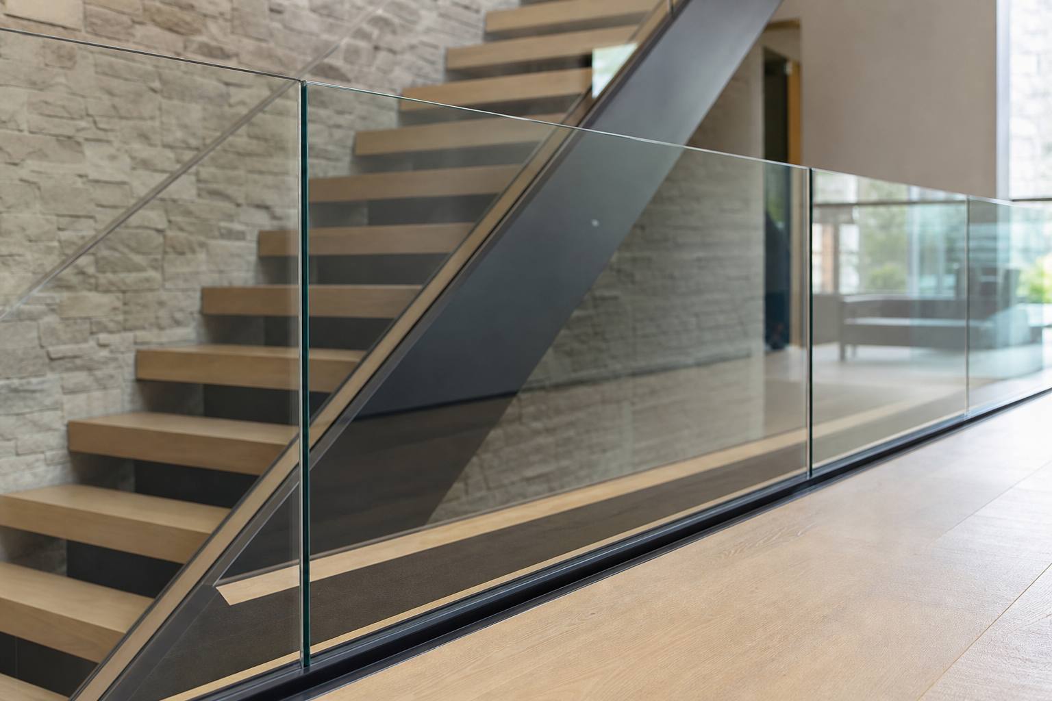 Frameless glass stair balustrade in a modern UK home, clear guarding line