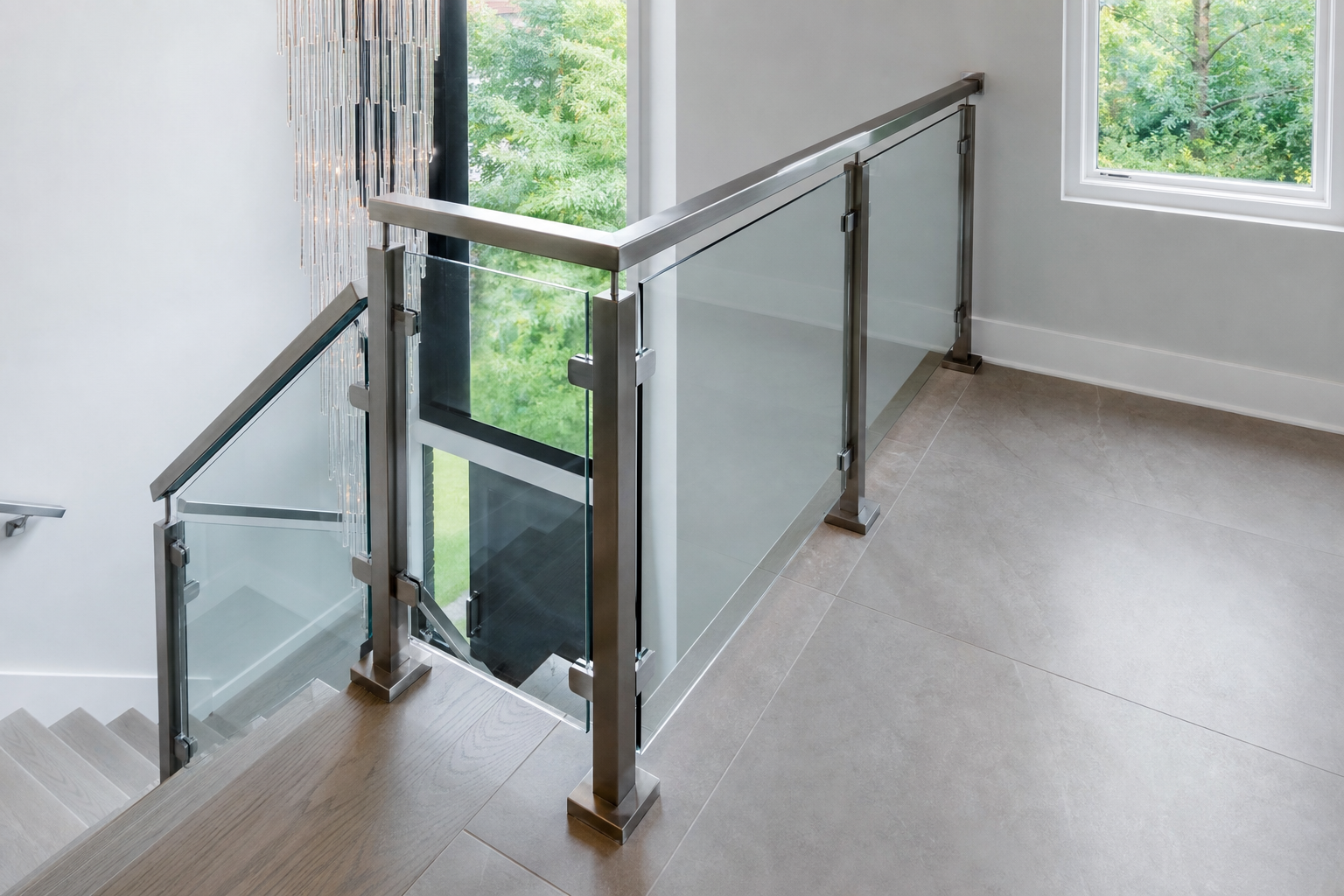 Terrace glass railing with square posts, clean orthogonal lines, natural light